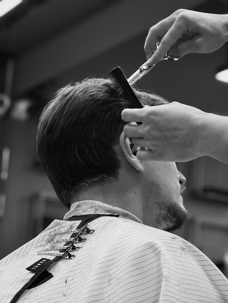 Newstead barber cutting a client's hair at White Wolf Studio